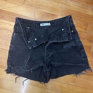 Two items: Zara shorts in black and white. With buttons down.